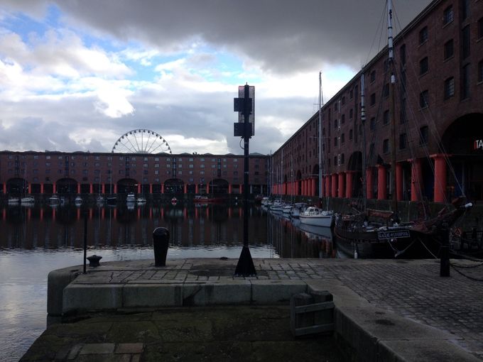 Mixed skies above the docks and the ever Turning Wheel of Fortune.